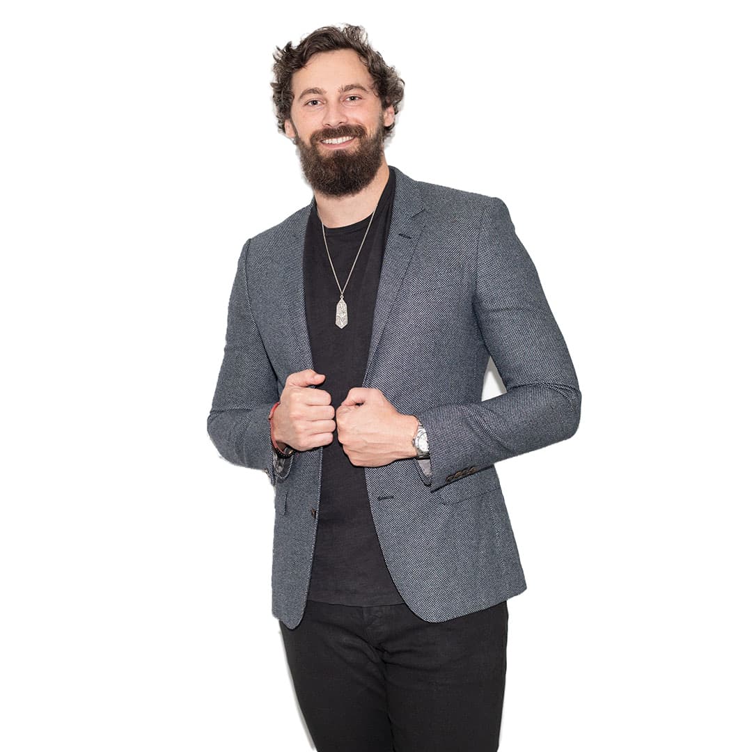 Will Mitchell, blazer, holding the lapels: full frame on a white background