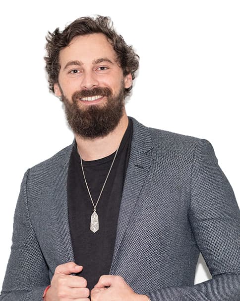 Will Mitchell, blazer, holding the lapels: head and shoulders on a white background