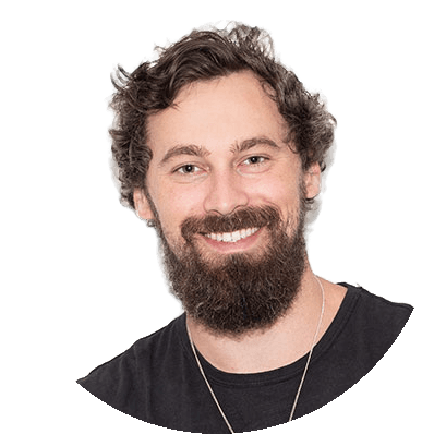Will Mitchell, tee, arms crossed: circle, background removed