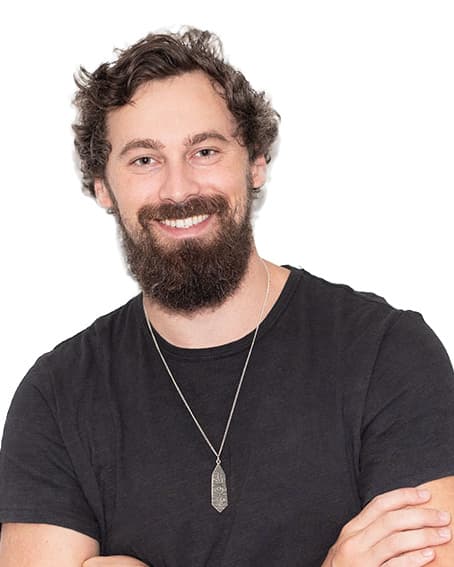 Will Mitchell, tee, arms crossed: head and shoulders on a white background