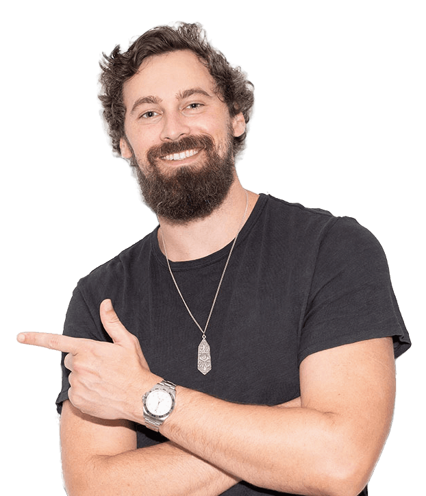 Will Mitchell, in a T-shirt, smiling and pointing at the form
