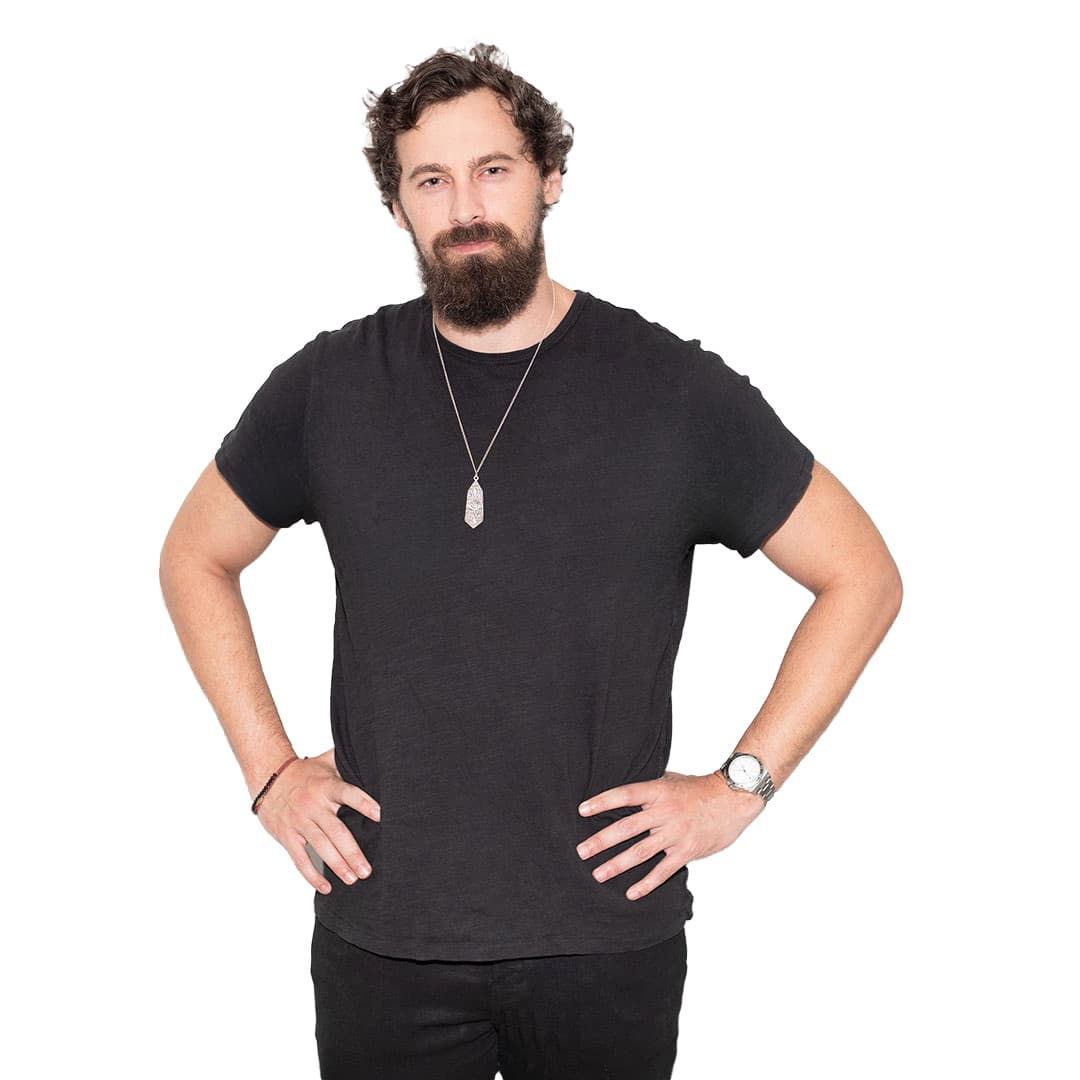 Will Mitchell, tee, hands on hips: full frame on a white background